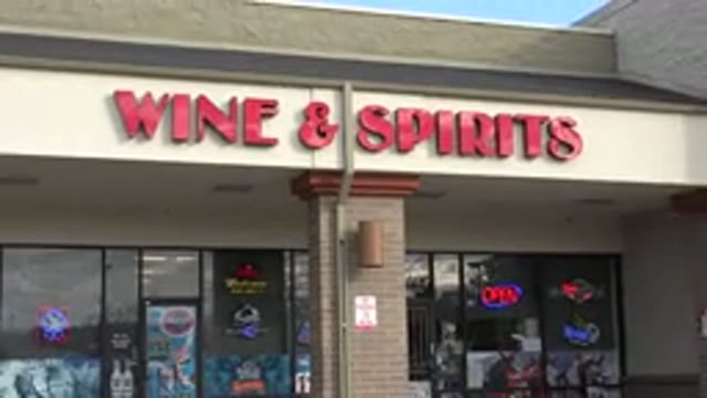 WESTMINSTER COLORADO-2015: Red Lettered Wine And Spirits Sign On A Sunny Day