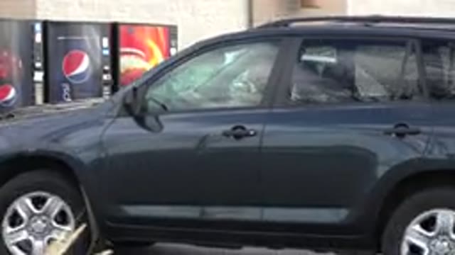 WESTMINSTER COLORADO-2015: Police Car Sitting In The Street While Other Cars Pass