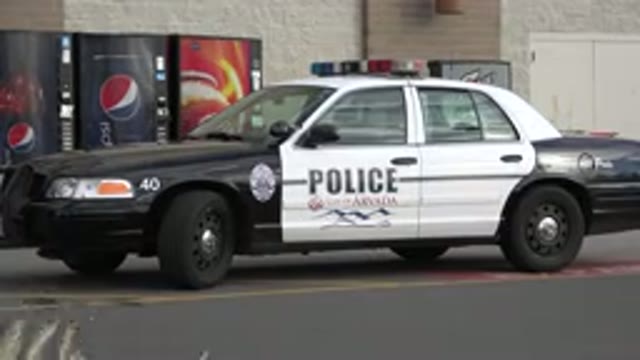 WESTMINSTER COLORADO-2015: Black And White Police Patrol Car Parked Behind
