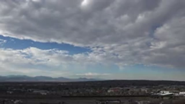 WESTMINSTER COLORADO-2015: Panning Shot Of The Sky Showing Huge Billowing White Clouds