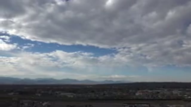 WESTMINSTER COLORADO-2015: Blue Sky Littered With Clouds Above A Populated And