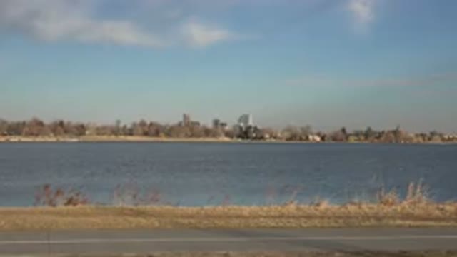 WESTMINSTER COLORADO-2015: Beautiful Landscape Of The River With City In The Background
