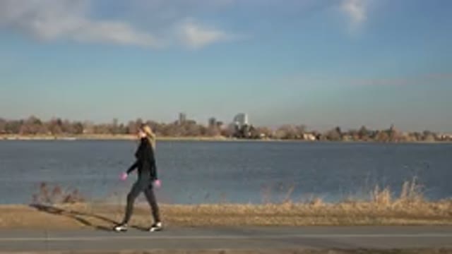 WESTMINSTER COLORADO-2015: The Alone Girl Walking On The Street Near The Calm