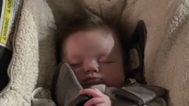 WESTMINSTER COLORADO-2015: Person Recording Infant Child Sleeping Peacefully In Car Seat
