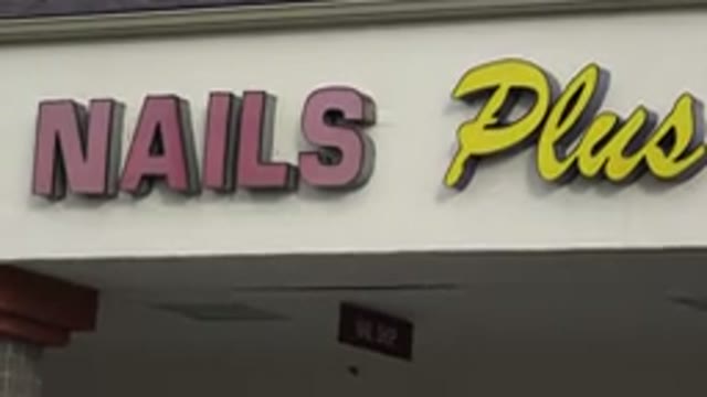 WESTMINSTER COLORADO-2015: A Washed Out Sign Called Nails in Red and Plus in Yellow