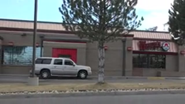 WESTMINSTER COLORADO-2015: Facade Of A Restaurant With Trees And Sky And Car