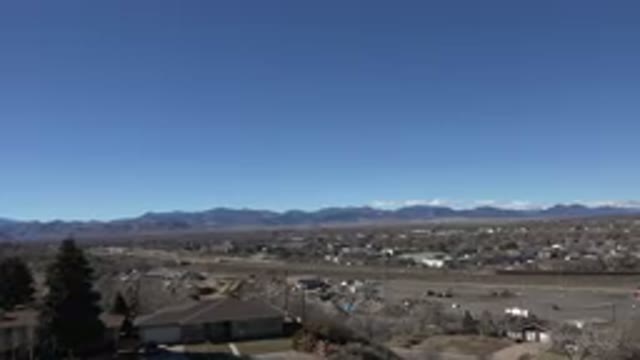 WESTMINSTER COLORADO-2015: Road Filled With Cars On A Normal Day With Mountains