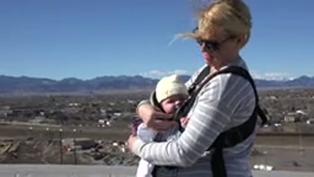WESTMINSTER COLORADO-2015: Blonde Woman With Sunglasses With Her Baby In A Stroller