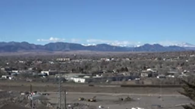 WESTMINSTER COLORADO-2015: Mountains And Low Lying White Clouds On A Clear Day
