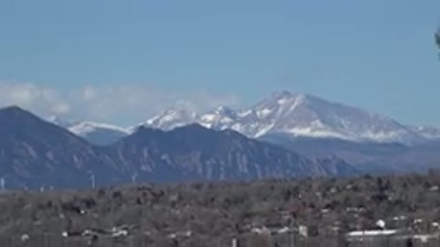WESTMINSTER COLORADO-2015: Mountains Green Trees And Blue Sky On A Clear Sunny