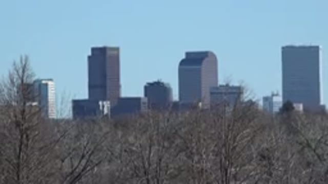 WESTMINSTER COLORADO-2015: Tall Buildings Standing Side by Side Over Trees