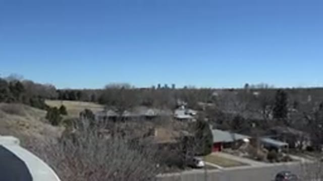 WESTMINSTER COLORADO-2015: Zoom Out Blue Sky Over Wooded City