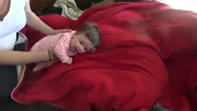 WESTMINSTER COLORADO-2015: Mother Caring for Her Cute Baby