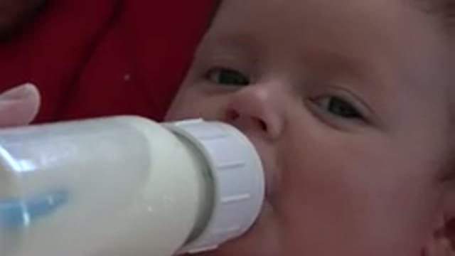 WESTMINSTER COLORADO-2015: Baby With Brown Eyes In Coach Drinking Milk