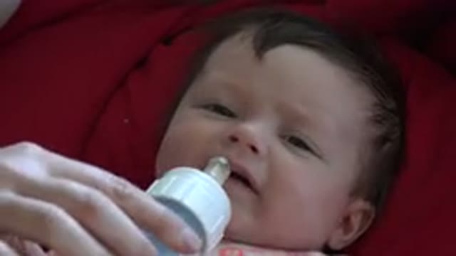 WESTMINSTER COLORADO-2015: Baby Being Fed With Baby Bottle