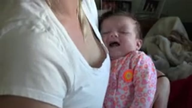 WESTMINSTER COLORADO-2015: Small Baby Cries While Being Rocked And Soothed By Mother