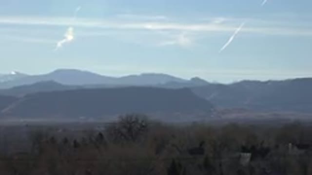 ARVADA COLORADO-2015: Image Of The Mountains And A Clear Sky With Trees Below