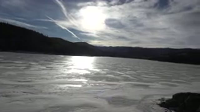 NEDERLAND COLORADO-2015: Scenic Land Cap Of A Frozen Body Of Water And A
