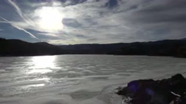 NEDERLAND COLORADO-2015: A Small Sea Corner With A Long Mountain Behind Makes A