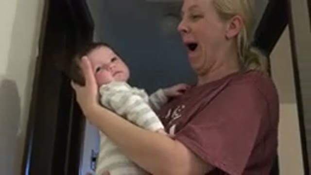 WESTMINSTER COLORADO-2015: Blonde Mother Cradling Baby in Arms