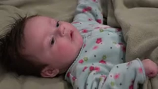 WESTMINSTER COLORADO-2015: Newborn Infant On Her Back Accepts And Takes Sip From Bottle