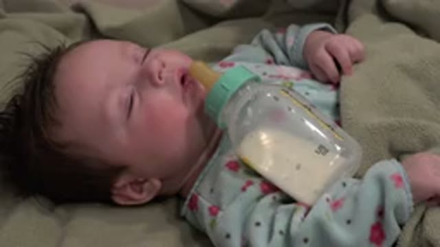 WESTMINSTER COLORADO-2015: Sleepy Baby Falls Asleep While Drinking Bottle Tucked