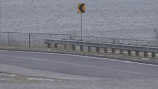 WESTMINSTER COLORADO-2015: Ocean View On A Gloomy Rainy Day As A Car Passes By