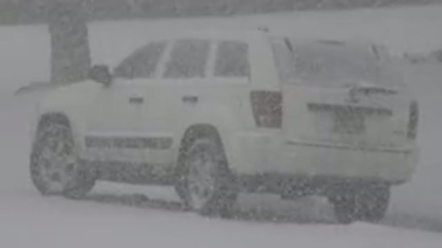 WESTMINSTER COLORADO-2015: White SUV Parked During Beautiful Heavy Snowfall
