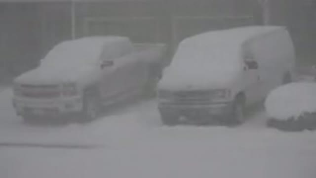 WESTMINSTER COLORADO-2015: Snow Covers A Truck And A Van As They Sit Side By