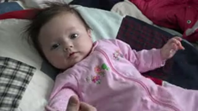 WESTMINSTER COLORADO-2015: Small Baby Moves While Parent Amuses The Child