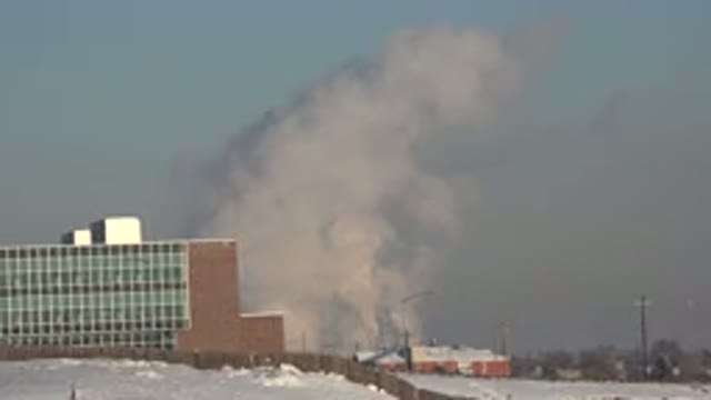WESTMINSTER COLORADO-2015: A Large White Cloud Above The Snow-Covered City