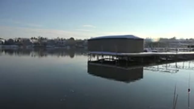 WESTMINSTER COLORADO-2015: A Building Sitting On A Pier Over The Water With
