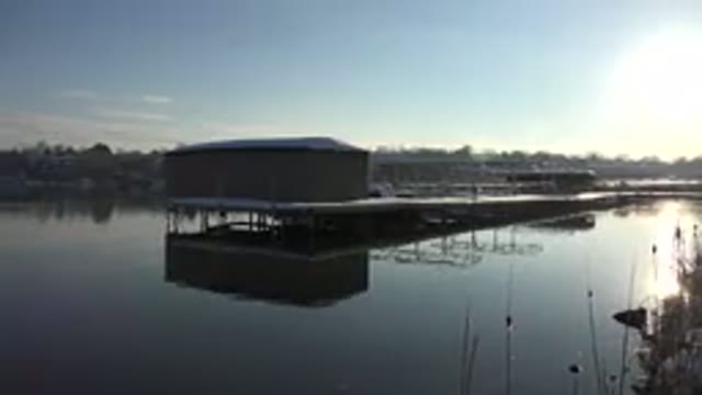 WESTMINSTER COLORADO-2015: House On A Frozen Lake With Snow And Lots Of Trees In