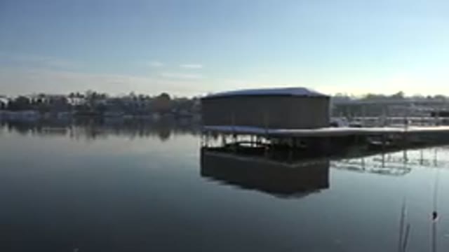 WESTMINSTER COLORADO-2015: Dock With Boathouse In Winter On Lake With Forest In