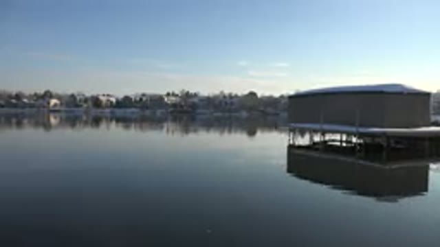 WESTMINSTER COLORADO-2015: Tan Structure On White Platform Over Calm Water