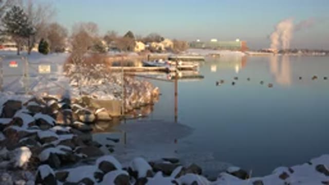 WESTMINSTER COLORADO-2015: Snow Covered Rocks And Blue Lake On A Sunny Day