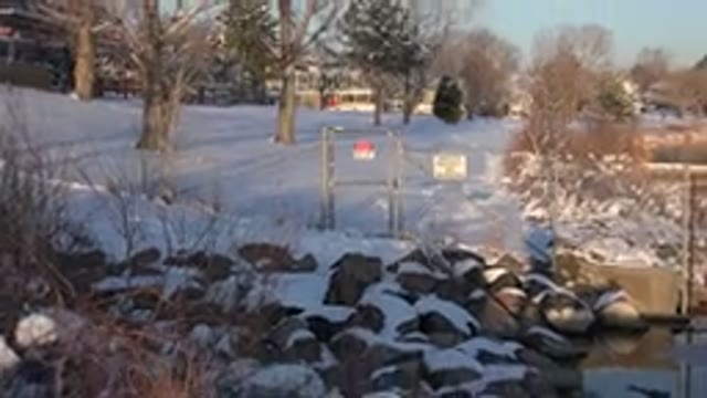 WESTMINSTER COLORADO-2015: The Snow Filled Ground With A Beautiful Water View