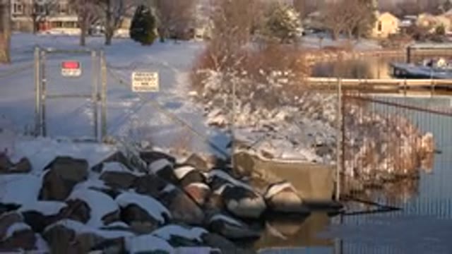 WESTMINSTER COLORADO-2015: A Slow Zooming Out Shot Of A Fence Beside A Frigid