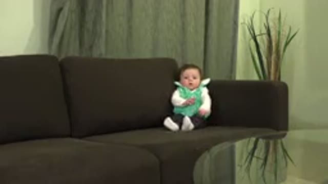 WESTMINSTER COLORADO-2015: Baby Boy Sitting Alone In The Living Room Coach