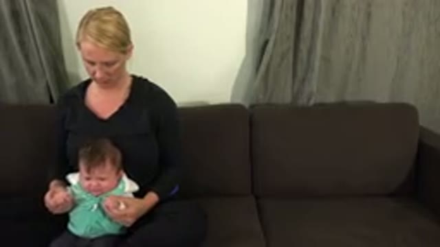 WESTMINSTER COLORADO-2015: Woman Playing With Her Baby