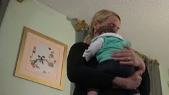 WESTMINSTER COLORADO-2015: Mother Rocks A Baby In Order To Put It To Sleep