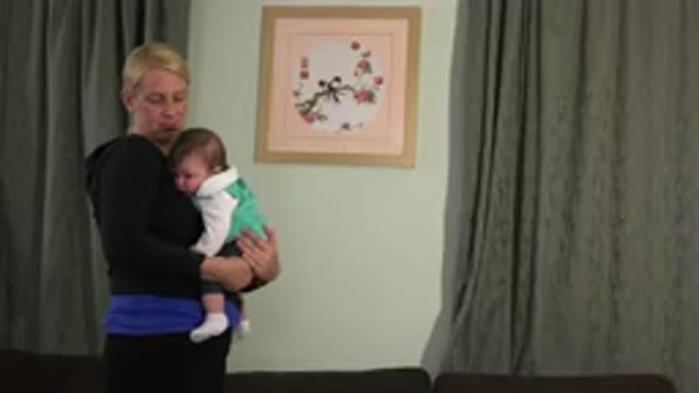 WESTMINSTER COLORADO-2015: Blonde Woman Holding Brown Haired Sleeping Baby In A
