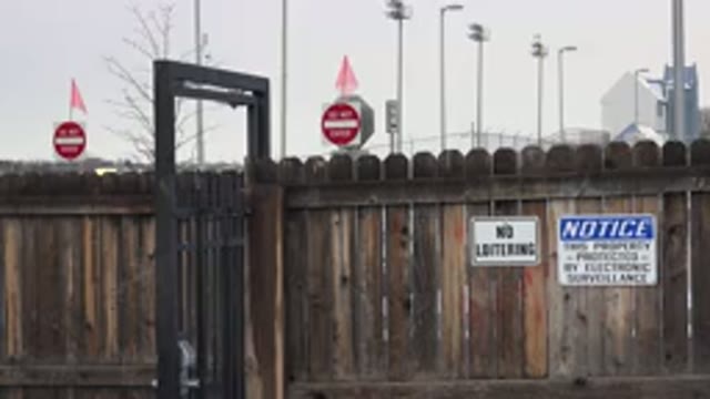 WESTMINSTER COLORADO-2015: Dark Brown Wooden Fence On A Cloudy Day