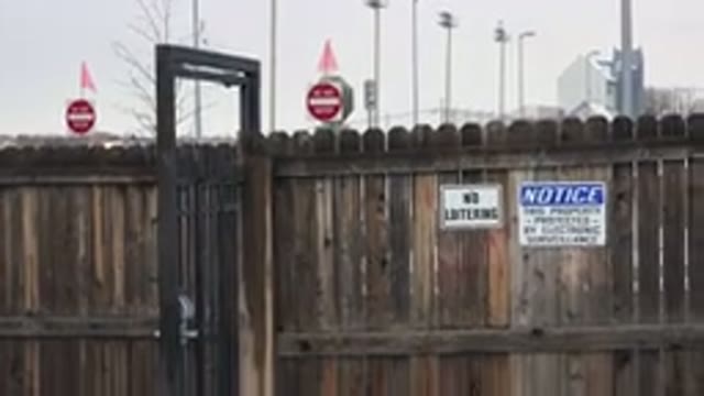 WESTMINSTER COLORADO-2015: Wooden Fence With Iron Gate In A Cloudy Weather With Snow