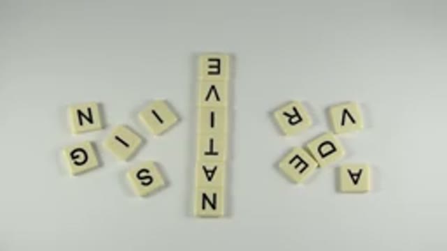 WESTMINSTER COLORADO-2015: A White Hand Grabs A Scrabble Letter From A Group Of
