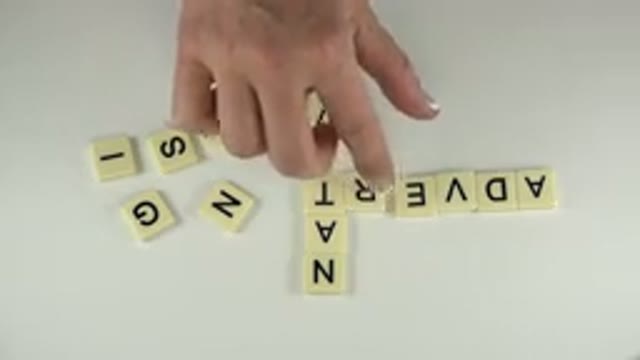 WESTMINSTER COLORADO-2015: Child Hand Matching Letters on White Table