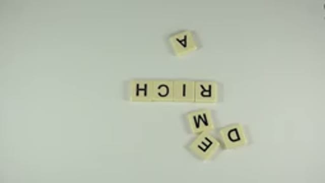 WESTMINSTER COLORADO-2015: Pieces Of Scrabble Game Showing The Word Rich And A