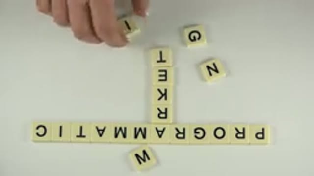WESTMINSTER COLORADO-2015: Man Adjusts Blocks Forming Letters