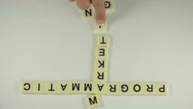WESTMINSTER COLORADO-2015: Tiles With Letters That Are Being Rearranged To Form