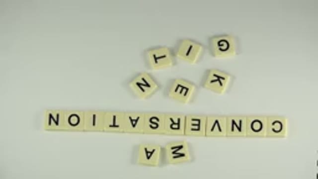 WESTMINSTER COLORADO-2015: Scrabble Tiles Laid On Table Out Spelling Out The
